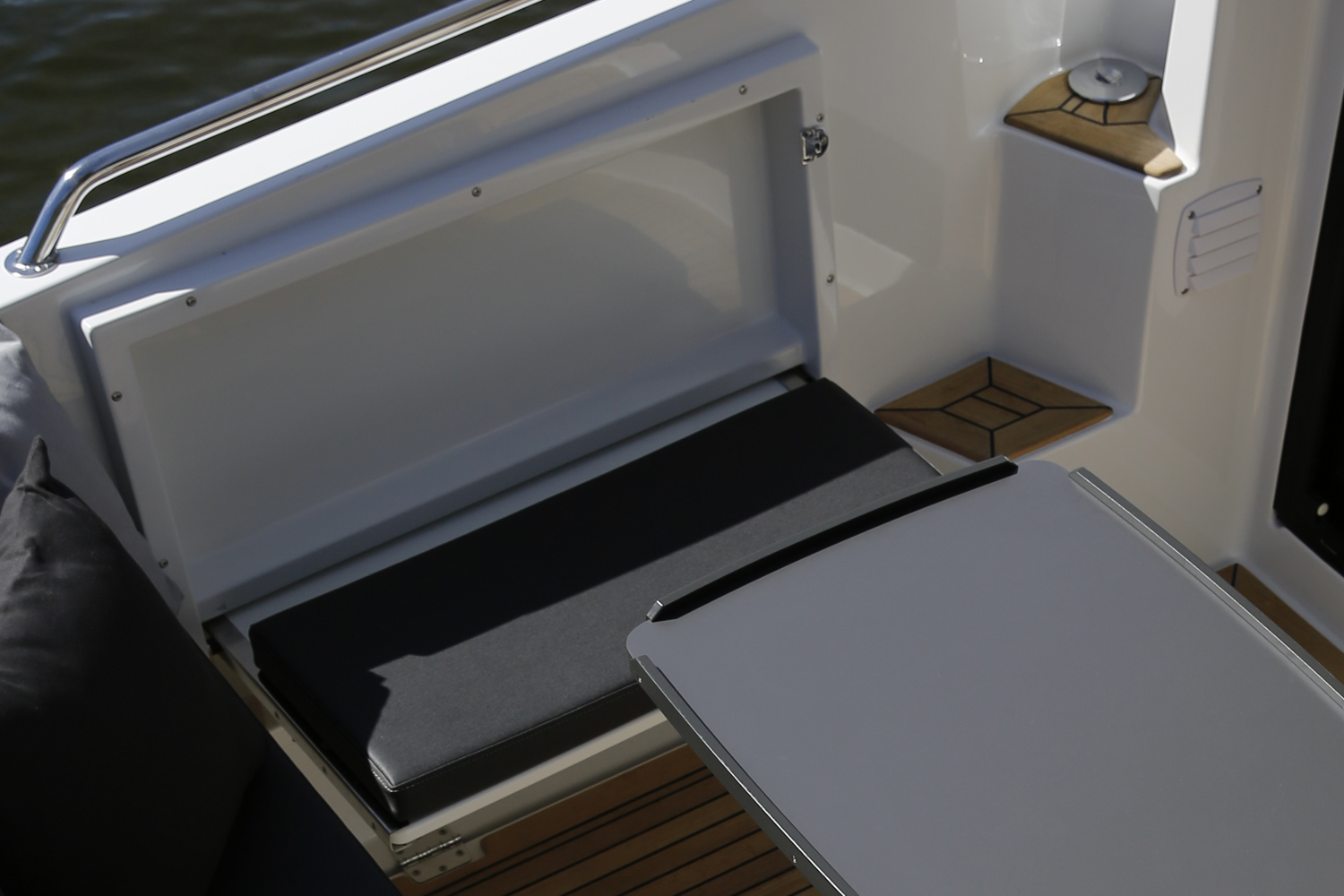 Folding bench in cockpit, port side
